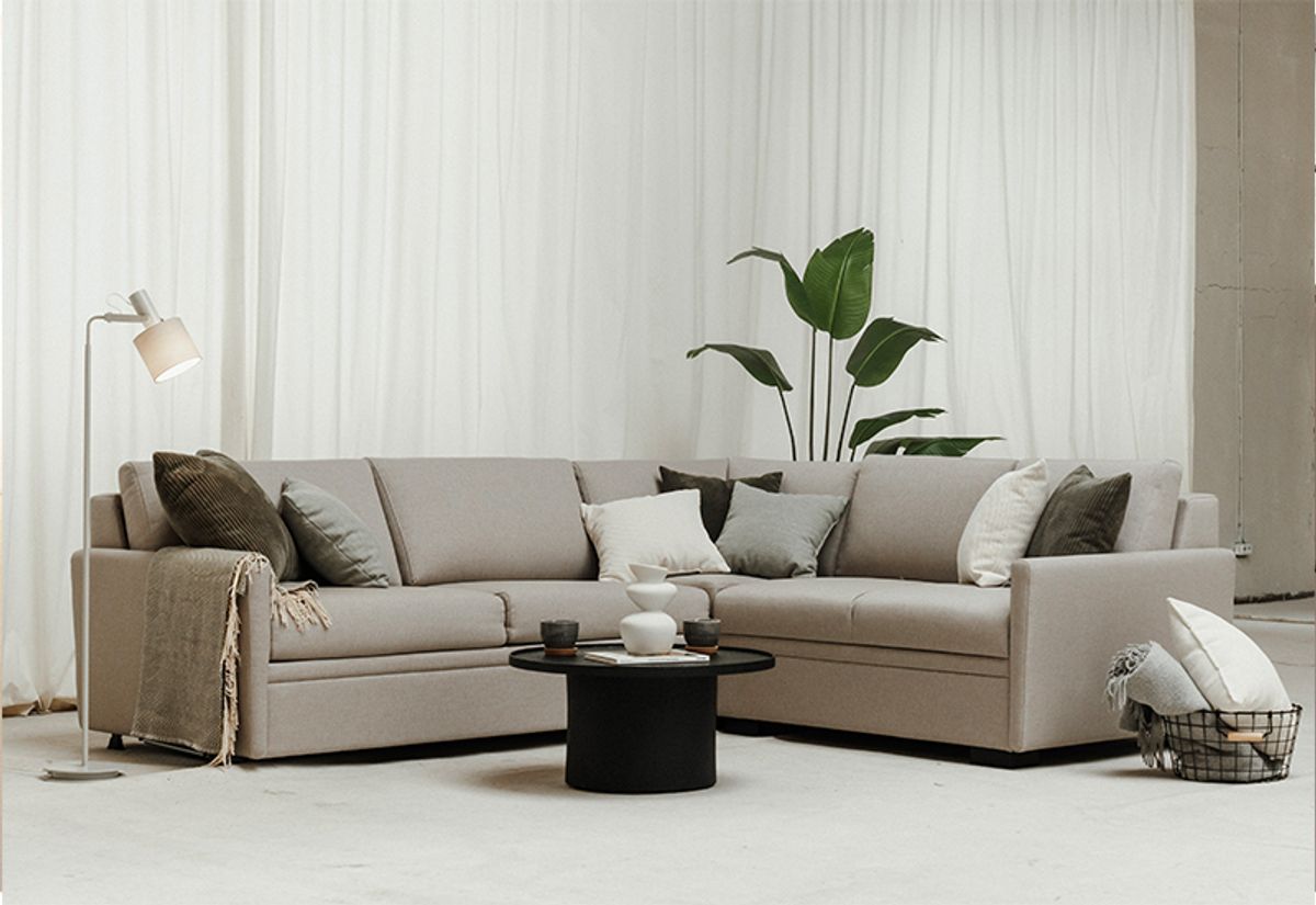 Harmony Hjørnesovesofa i grått tekstil bed innside